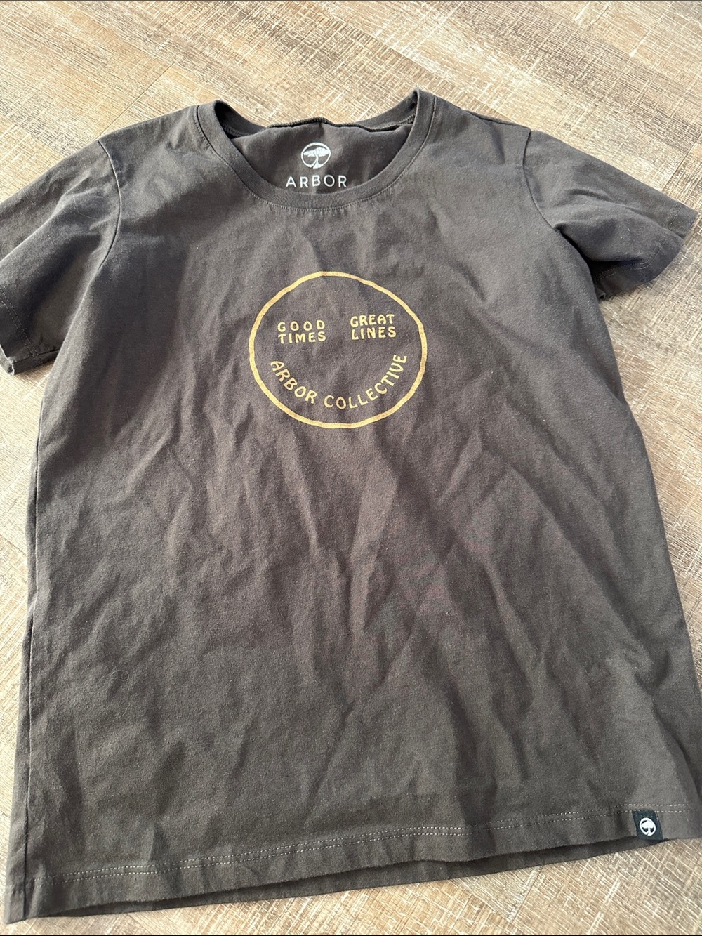 Arbor Black Short-Sleeve Tee with Gold Circle Graphic